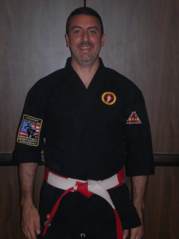 Master Wade Kirkpatrick in his black karate uniform